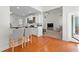 Modern kitchen with an open layout, hardwood floors, and seamless access to the living space at 116 Edgeview Ct, Dallas, GA 30157