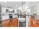 Bright kitchen with white cabinets, stainless steel appliances, and a breakfast nook at 116 Edgeview Ct, Dallas, GA 30157