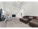 Spacious living room with vaulted ceilings, a stone fireplace, and an abundance of natural light at 116 Edgeview Ct, Dallas, GA 30157