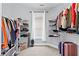 Spacious walk-in closet with custom shelving and ample storage space at 116 Edgeview Ct, Dallas, GA 30157