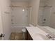 This bathroom features a shower and single vanity at 3005 Stonebrook Cv, Austell, GA 30106
