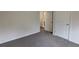 Cozy bedroom with neutral carpet, white walls, and closet doors at 3005 Stonebrook Cv, Austell, GA 30106