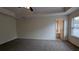 Bedroom with trey ceilings, ceiling fan, and natural lighting at 3005 Stonebrook Cv, Austell, GA 30106