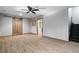Finished basement featuring tile floors, barn door and staircase at 3335 Maple Terrace Dr, Suwanee, GA 30024