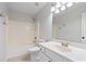 Bathroom featuring a shower-tub combo and single sink vanity at 3335 Maple Terrace Dr, Suwanee, GA 30024