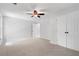 The bedroom offers ample space, a ceiling fan, and a conveniently located closet at 3335 Maple Terrace Dr, Suwanee, GA 30024