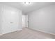 This bedroom boasts plush carpeting and a spacious layout for comfortable living at 3335 Maple Terrace Dr, Suwanee, GA 30024