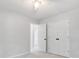 Neutral bedroom featuring a ceiling fan, closet, and adjoining bath at 3335 Maple Terrace Dr, Suwanee, GA 30024