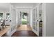 Light-filled foyer with a tile entry, French doors, and views of the front yard at 3335 Maple Terrace Dr, Suwanee, GA 30024