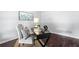Bright home office with modern desk, stylish chair, and contemporary artwork creating an inviting workspace at 3335 Maple Terrace Dr, Suwanee, GA 30024