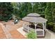 Charming gazebo overlooking the playground with slides and climbing equipment, great for relaxation at 3335 Maple Terrace Dr, Suwanee, GA 30024