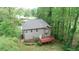 Aerial view of backyard featuring a deck and mature landscaping at 71 Anita Se Pl, Mableton, GA 30126