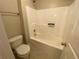 Clean bathroom showcasing a well-maintained shower-tub combo with tile flooring at 71 Anita Se Pl, Mableton, GA 30126