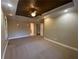 This spacious bedroom features a tray ceiling, neutral tones, and carpet flooring at 71 Anita Se Pl, Mableton, GA 30126