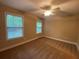 Bedroom featuring neutral walls, carpet flooring, and a ceiling fan at 71 Anita Se Pl, Mableton, GA 30126
