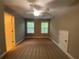 Neutral bedroom with carpet, natural light, and ceiling fan at 71 Anita Se Pl, Mableton, GA 30126