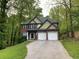 Beautiful two-story brick home with a well-maintained lawn and a two-car garage at 71 Anita Se Pl, Mableton, GA 30126
