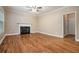 Spacious living room with hardwood floors, fireplace, and plenty of natural light, great for Gathering time at 71 Anita Se Pl, Mableton, GA 30126