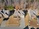 Aerial view of a well-maintained home with manicured lawn, mature trees and landscaping in a desirable neighborhood at 1070 Cureton Dr, Austell, GA 30106