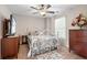 Charming bedroom with a metal bed frame and plenty of natural light at 1070 Cureton Dr, Austell, GA 30106