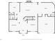 First floor plan showing the layout of the main level, including the kitchen, living room, office, and garage at 1070 Cureton Dr, Austell, GA 30106