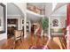 Spacious foyer featuring hardwood floors, an elegant staircase, and plenty of natural light at 1070 Cureton Dr, Austell, GA 30106