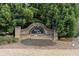Decorative stone entry sign to the Cureton Woods neighborhood at 1070 Cureton Dr, Austell, GA 30106