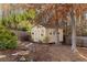 Backyard shed offering great storage space with a tidy and functional design, all set in a well-maintained yard at 1070 Cureton Dr, Austell, GA 30106