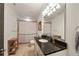 Bathroom featuring a marble countertop, single sink, and a shower with neutral tone tile at 1226 Goodwin Ne Rd, Atlanta, GA 30324
