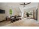 Bonus room with seating area, desk area, and a vaulted ceiling at 1226 Goodwin Ne Rd, Atlanta, GA 30324