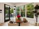 Breakfast nook with wood table, four chairs, and a view of the backyard at 1226 Goodwin Ne Rd, Atlanta, GA 30324