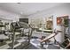 Home gym featuring lots of natural light and an assortment of exercise equipment at 1226 Goodwin Ne Rd, Atlanta, GA 30324