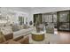 Open living room flows to the screened porch, offering versatile indoor-outdoor living at 1226 Goodwin Ne Rd, Atlanta, GA 30324