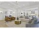 Spacious open-concept living room with modern decor and seamless transition to the gourmet kitchen at 1226 Goodwin Ne Rd, Atlanta, GA 30324