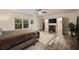 Spacious primary bedroom featuring a window, mounted television, and walk-in closet at 1226 Goodwin Ne Rd, Atlanta, GA 30324