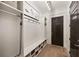 Mud room with bench, storage cubbies, coat hooks, and a dark wood door at 1226 Goodwin Ne Rd, Atlanta, GA 30324