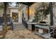 Back patio with outdoor cooking area including a grill and pizza oven at 1226 Goodwin Ne Rd, Atlanta, GA 30324