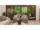 Inviting screened porch provides a serene outdoor living space overlooking lush greenery at 1226 Goodwin Ne Rd, Atlanta, GA 30324