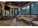 Covered and screened porch features comfortable seating and dining area for outdoor enjoyment at 1226 Goodwin Ne Rd, Atlanta, GA 30324