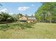 Expansive backyard with a screened porch and a wooden deck, ideal for entertaining or serene outdoor living at 1522 Sprayberry Dr, Marietta, GA 30066