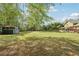 The backyard includes a storage shed, a tire swing, and mature trees at 1522 Sprayberry Dr, Marietta, GA 30066