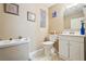 Bathroom featuring hexagon tile floors, a white vanity, and neutral walls at 1522 Sprayberry Dr, Marietta, GA 30066