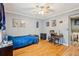 Relaxing bedroom with hardwood floors, ceiling fan, desk, and ample space at 1522 Sprayberry Dr, Marietta, GA 30066