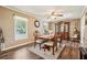 Traditional dining room featuring wood floors, a china cabinet, and two windows at 1522 Sprayberry Dr, Marietta, GA 30066