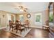 Formal dining room with hardwood floors, classic furniture, and natural light at 1522 Sprayberry Dr, Marietta, GA 30066