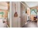 Hallway featuring access to the living room and laundry room at 1522 Sprayberry Dr, Marietta, GA 30066