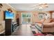 Comfortable living room with modern flooring, natural light and slider to patio at 1522 Sprayberry Dr, Marietta, GA 30066