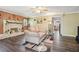 Charming living room featuring a stone fireplace, hardwood floors, and neutral decor at 1522 Sprayberry Dr, Marietta, GA 30066