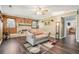 Comfortable living room with modern flooring, stone fireplace and natural light at 1522 Sprayberry Dr, Marietta, GA 30066