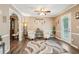 Open living area with modern flooring, neutral paint and walk out to patio at 1522 Sprayberry Dr, Marietta, GA 30066